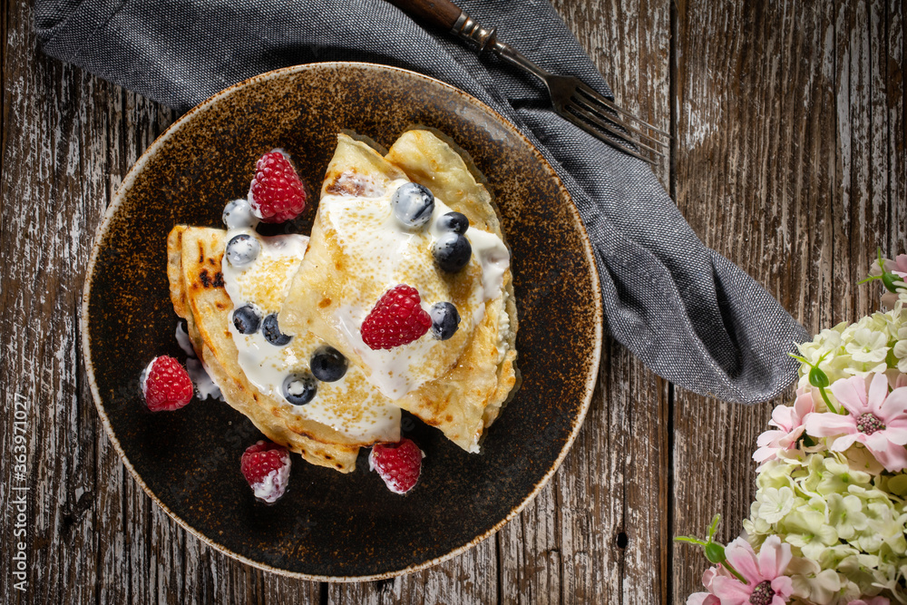 Pancakes with white cheese and fruit. Pancakes with white cheese and fruit.