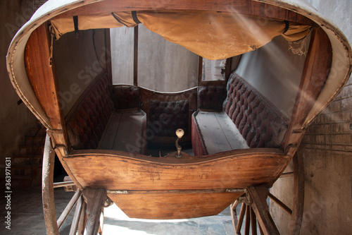 Old carriage inside modernist church