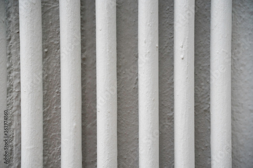 Several pipes on the white wall