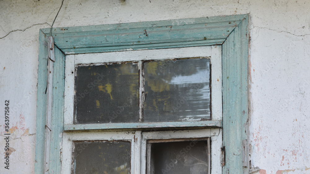 old broken window on the wall old broken window on the wall