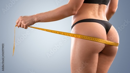 Woman and tape measure.