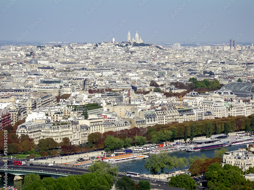 Panorama of Paris from the height of Eiffel tower. White limestone buildings and white city.
