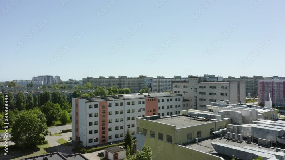 Aerial View of the Roof of an Office Building With Solar Panels Mounted on the Flat Roof of a Building. Solar Panels on Roof Providing the Residential Part With Renewable Energy From the Sun.
Aerial View of the Roof of an Office Building With Solar Panels Mounted on the Flat Roof of a Building. Solar Panels on Roof Providing the Residential Part With Renewable Energy From the Sun.