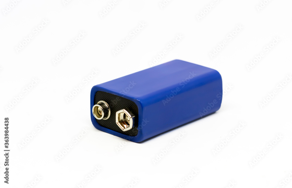 a blue 9 volt battery isolated on a white background a blue 9 volt battery isolated on a white background
