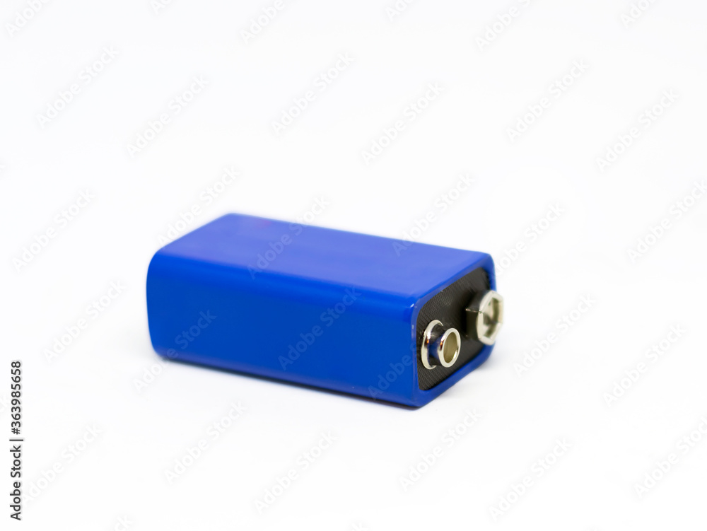 a blue 9 volt battery isolated on a white background a blue 9 volt battery isolated on a white background