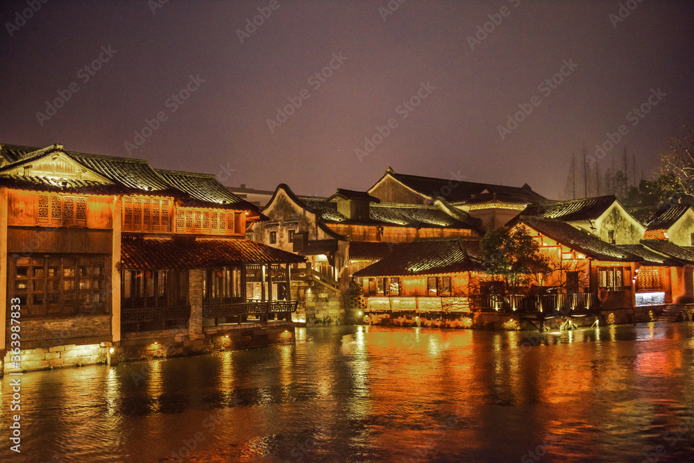 Fototapeta premium Wuzhen,Tongxiang city,Zhejiang province,Chine. The night view of ancient town,Wuzhen, is a famous historical,cultural and traditional water town.