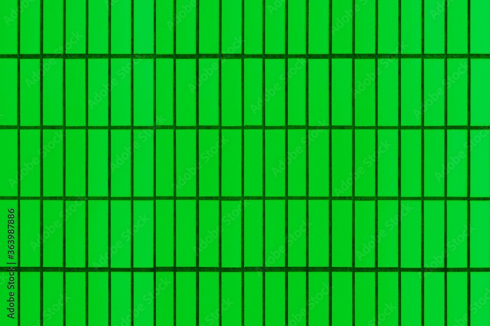 Patterned green cement fence wall texture and background seamless