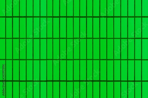 Patterned green cement fence wall texture and background seamless