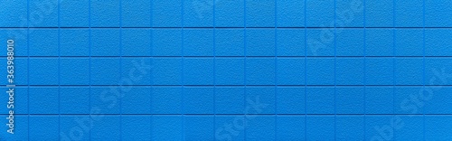 Panorama of Cement block wall Painted blue sea texture and seamless background