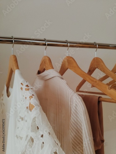 clothes hanging on hangers