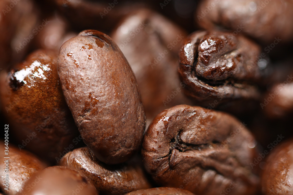 Brown coffee beans, closeup macro for background and texture. Brown coffee beans, closeup macro for background and texture.