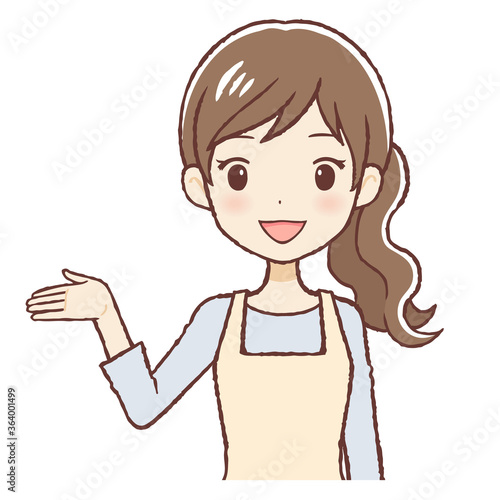 右手を上げて案内するエプロン女性 上半身