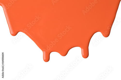 orange paint dripping on white background.