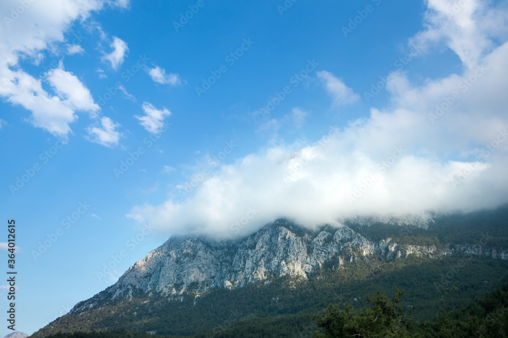 Beautiful Turkish mountains on a background of cloudy sky.