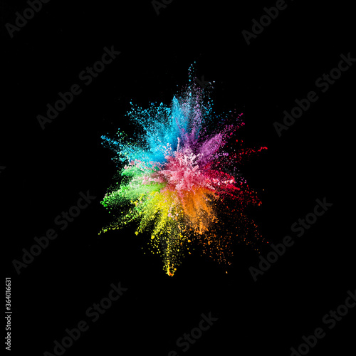 multi-color powder explosion on black background.