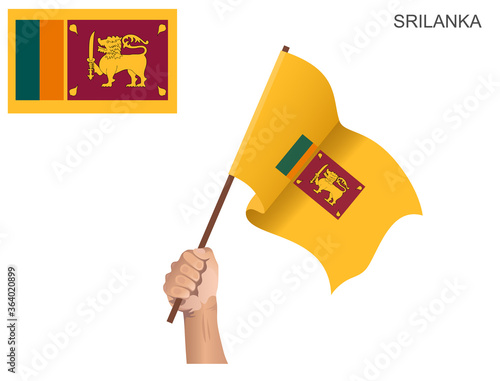 Sri Lanka's flag which is hoisted with a stick held by hand to inflame the spirit of statehood