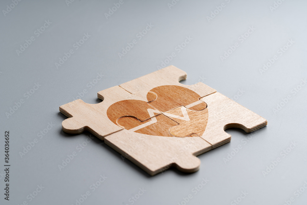 Medical icon on jigsaw puzzle for global health care