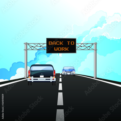 Highway digital overhead gantry sign with back to work message following the COVID 19 economic shutdown with cloudy blue sky  photo