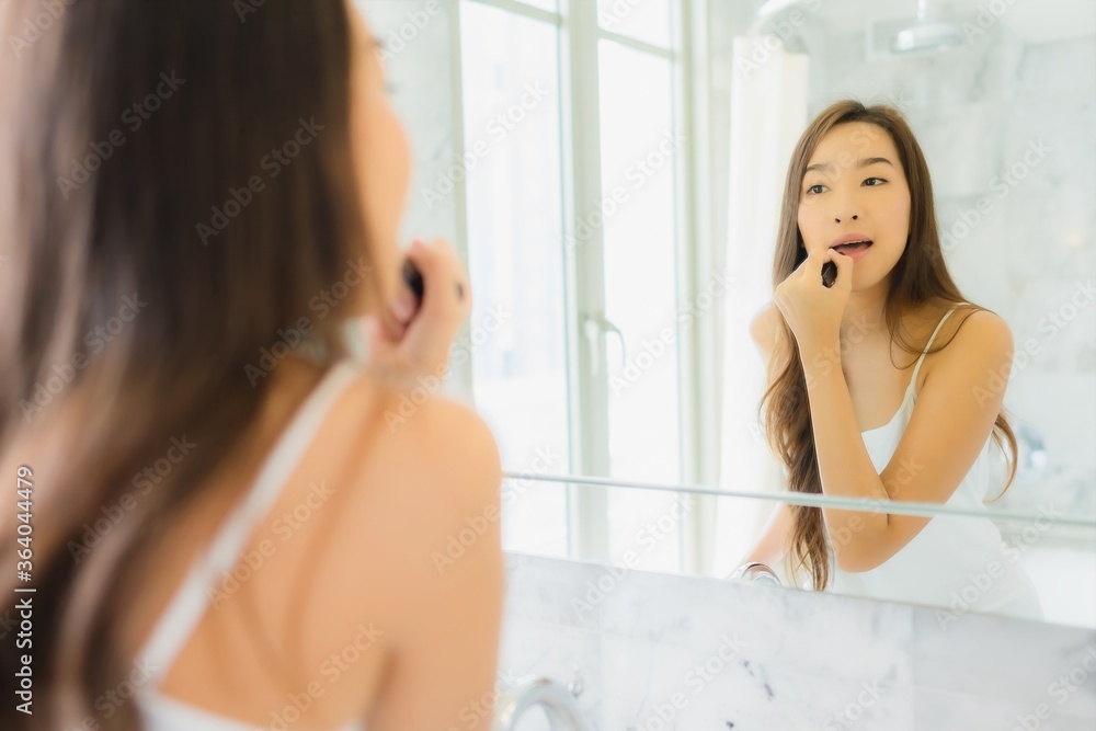 Portrait beautiful young asian woman check up and make up her face Portrait beautiful young asian woman check up and make up her face