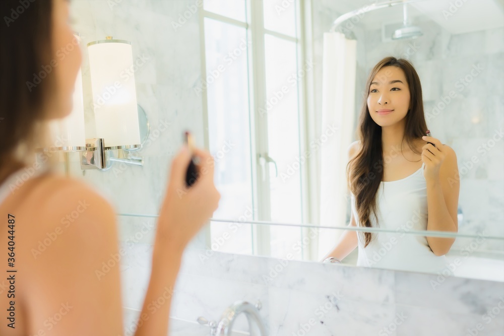 Portrait beautiful young asian woman check up and make up her face Portrait beautiful young asian woman check up and make up her face