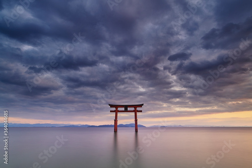 Long exposure shot of Shirahige shrine Torii gate at sunset at Lake Biwa  Shiga Prefecture  Japan