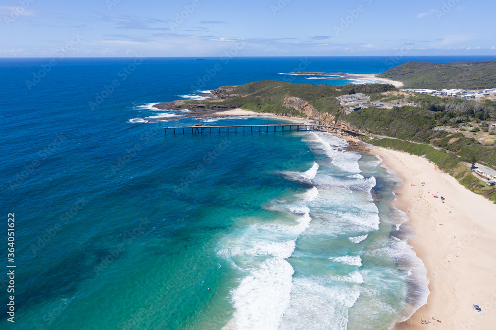 Aerial view of Catherine Hill Bay NSW Australia showing the old Jetty previously used for coal loading.