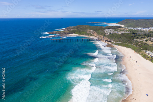 Aerial view of Catherine Hill Bay NSW Australia showing the old Jetty previously used for coal loading.
