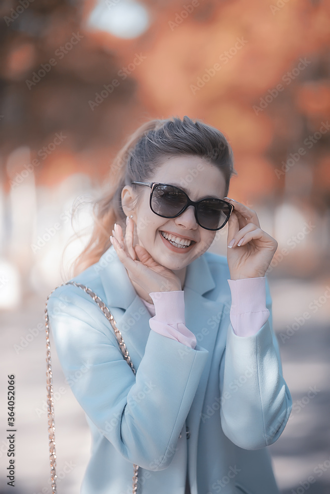 autumn girl / portrait of a girl in an autumn city park, walk happy weekend female portrait autumn girl / portrait of a girl in an autumn city park, walk happy weekend female portrait
