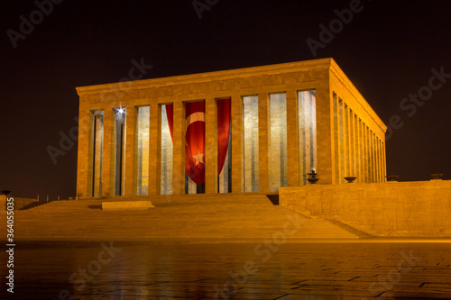 Mustafa Kemal Ataturk`s (founder and first President of Turkish Republic) Mausoleum, Anitkabir, with Turkish flag in Ankara, Turkey, by night. photo