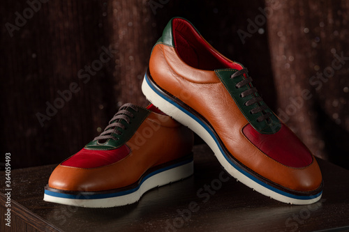 Elegant leather male shoes in the shop. expensive modern shoes for men