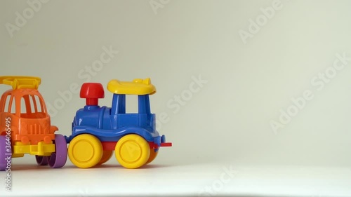 toy cars collided in an accident on a white background Crash on a toy road Slow motion
