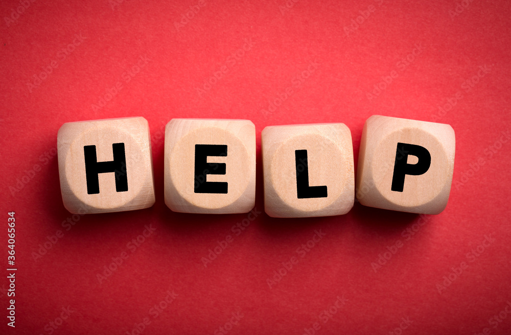 Obraz premium Help Concept Wooden Cube Blocks