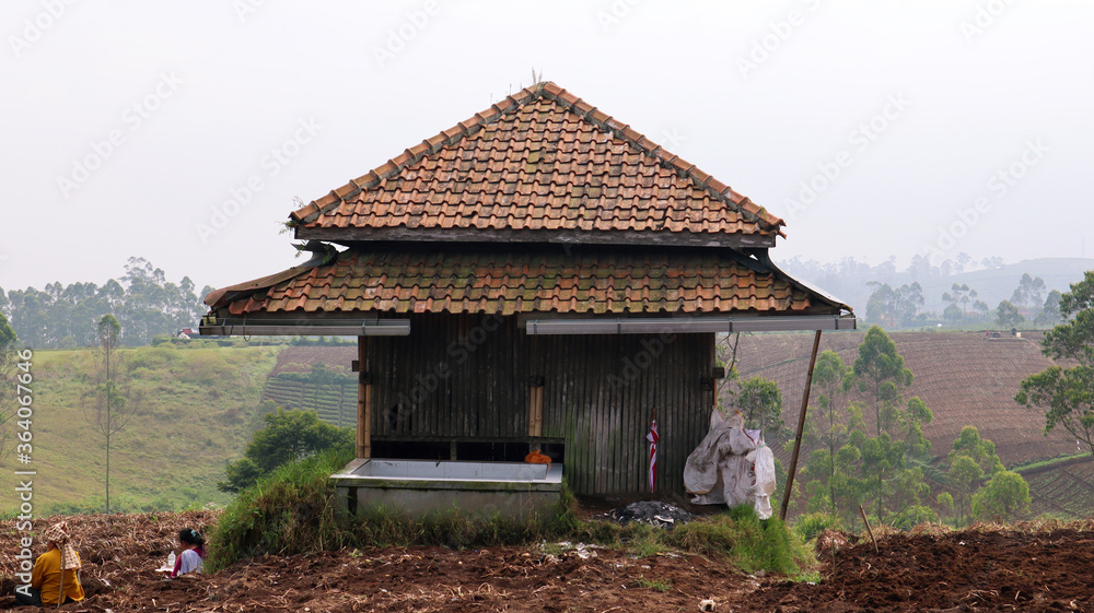 a wooden shack on the hills - Pangalengan, Jawa Barat, Indonesia a wooden shack on the hills - Pangalengan, Jawa Barat, Indonesia