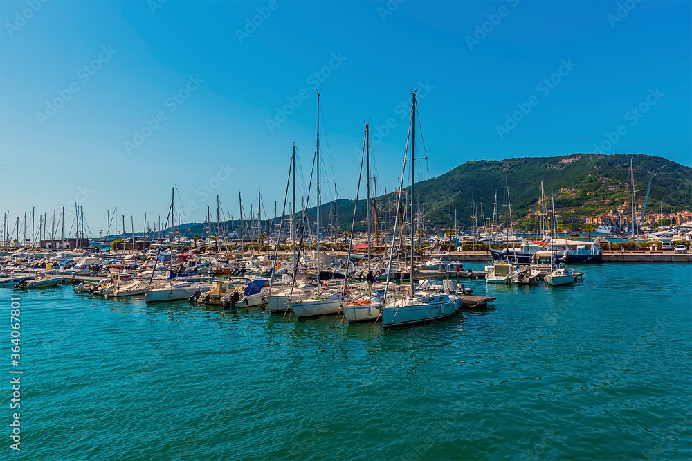 A view across the marina looking to the headland at La Spezia, Italy in the summertime