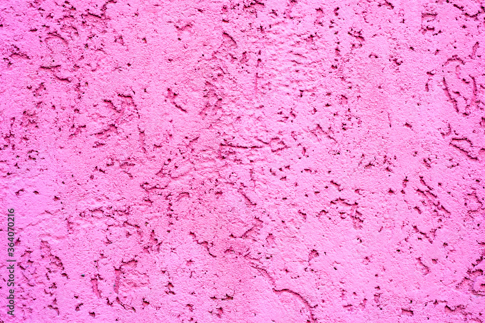 Texture plaster painted in pink paint