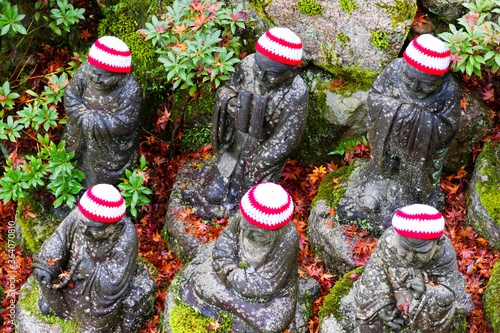 Japan - Ksitigarbha statues in Daishouin Buddhist temple on the island Miyajima in Hatsukaichi (Hiroshima prefecture, region Chugoku). photo