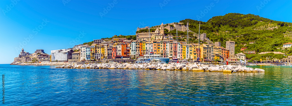 A panorama view across the breakwater and harbour of Porto Venere, Italy in the summertime