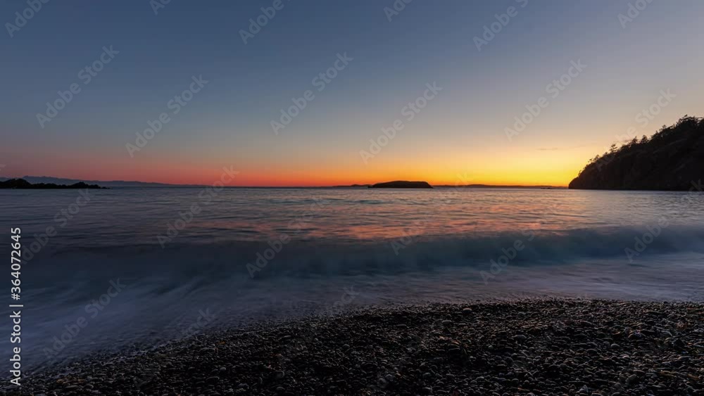 Rosario Beach Washington Sunset Time Lapse with Waves Crashing on Shore Rosario Beach Washington Sunset Time Lapse with Waves Crashing on Shore