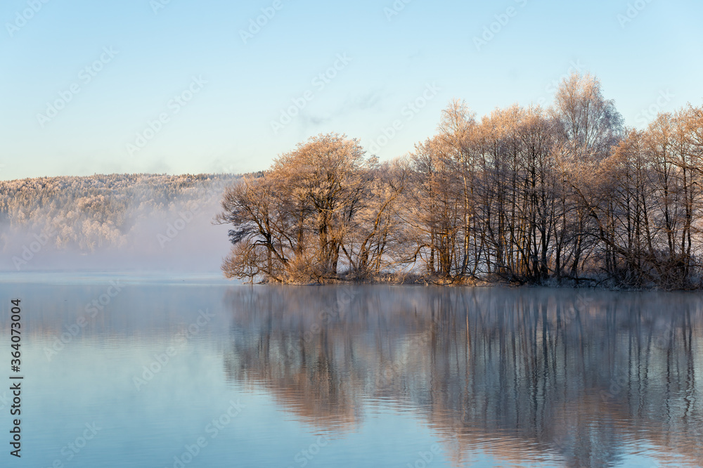 Misty morning, dancing fairies, swirling fog, at sunrise, dawn. Early winter landscape with frost. Misty blue pink background with place for text, copy space.