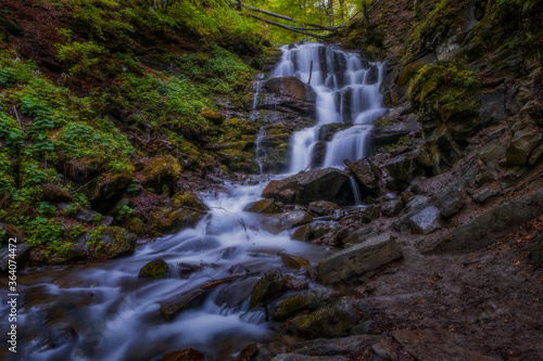 Carpathian waterfall Shypot or Shypit in the spring may day 2020. Beautiful nature scenery. popular tourist attraction. Long exposure shot