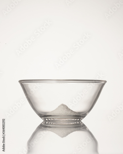 Powder in a transparent bowl.