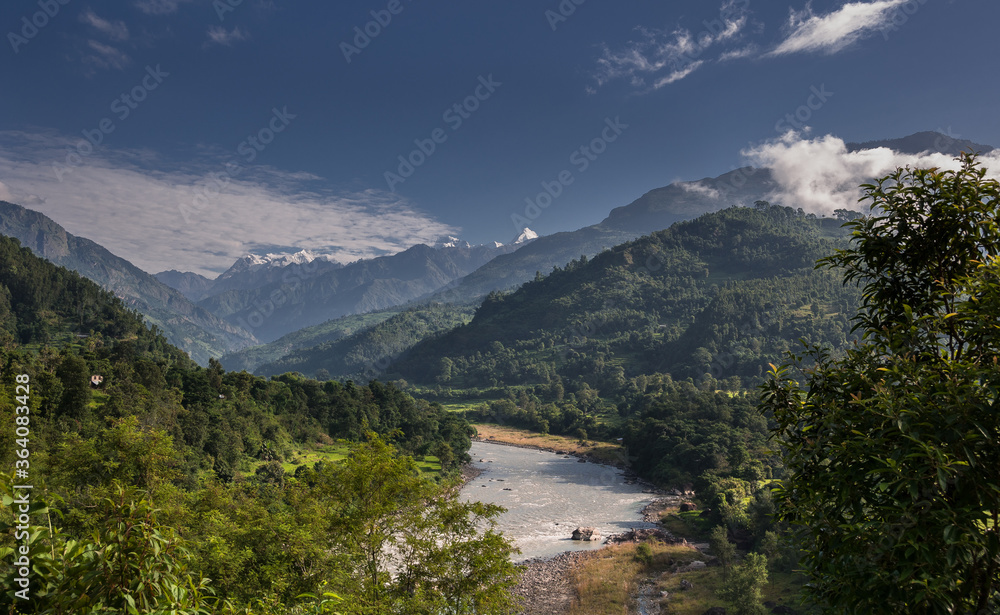 Budhi Gandaki river, a tributary of Gandaki/Narayani river as seen along Manaslu Circuit trek route from Arughat Bazar to Jagat villages, Gorkha district, Nepal Himalaya, Nepal. Budhi Gandaki river, a tributary of Gandaki/Narayani river as seen along Manaslu Circuit trek route from Arughat Bazar to Jagat villages, Gorkha district, Nepal Himalaya, Nepal.