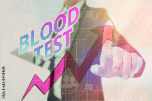 Writing note showing Blood Test. Business concept for Extracted blood sample from an organism to perfom a laboratory analysis Arrow symbol going upward showing significant achievement photo