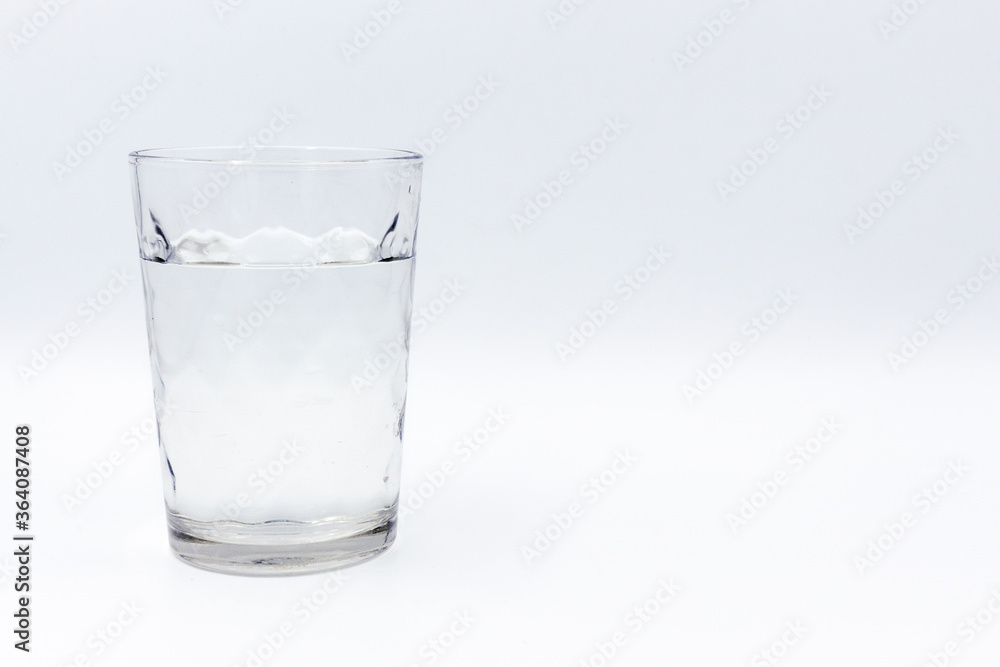 Transparent glass glass with water on a white background Transparent glass glass with water on a white background