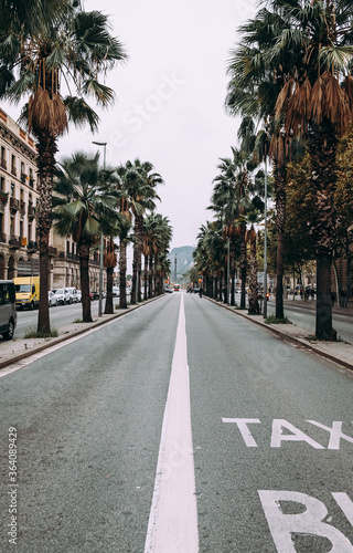Empty asphalt road in European city