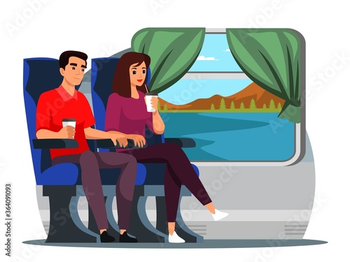People sitting drinking coffee travelling by train