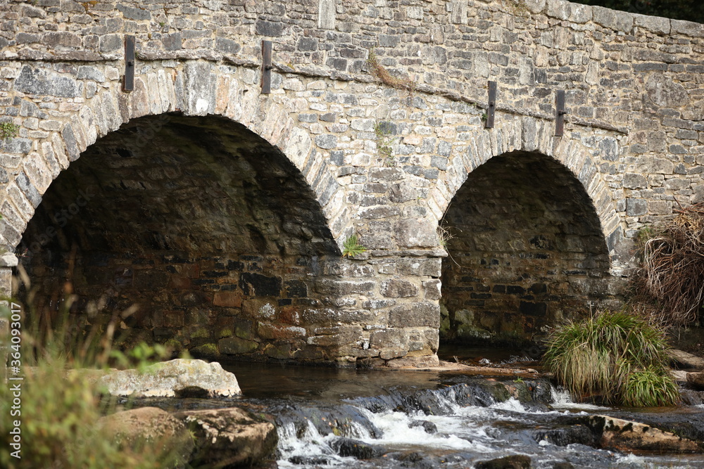 Stone bridges near Moretonhampstead a market town, parish and ancient manor in Devon, situated on the north-eastern edge of Dartmoor, within the Dartmoor National Park.