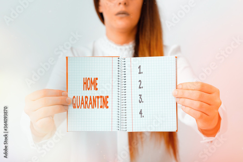 Word writing text Home Quarantine. Business photo showcasing Encountered a possible exposure from the public for observation Model displaying different empty color notepad mock-up for writing idea photo