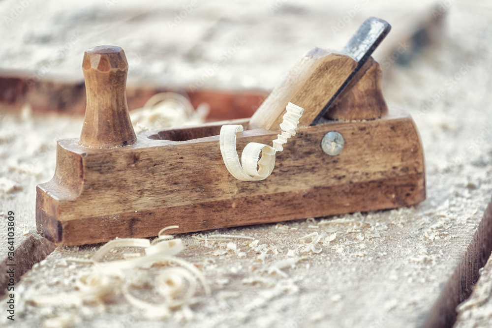 Old wooden planer - a tool for wood processing Old wooden planer - a tool for wood processing