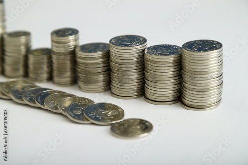 Currencies and money exchange trading concepts. Qatari  Coins ,Qatari Currency roll  photo